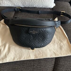 Louis Vuitton leather bumbag in black.